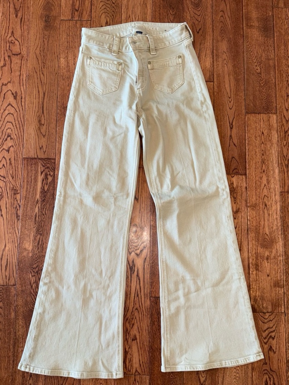 American Eagle Outfitters High-Rise Flare Leg Jeans — light khaki/tan